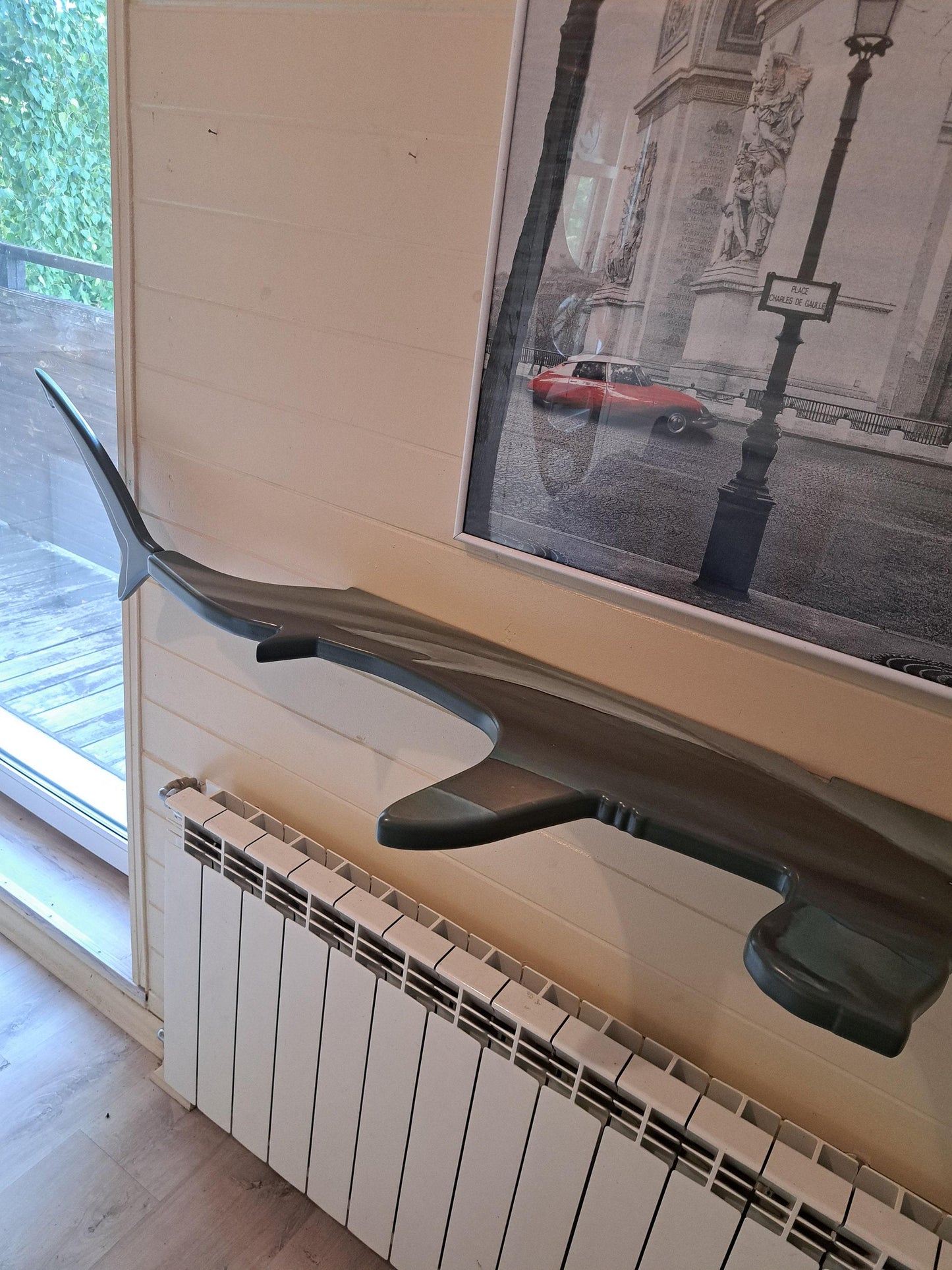Shelf in the shape of a hammerhead shark for wall decoration