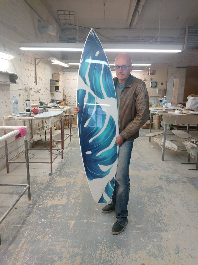 Handmade White Surfboard Wall Hanging with Blue-Emerald Monstera Leaves Pattern