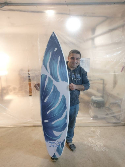 Handmade White Surfboard Wall Hanging with Blue-Emerald Monstera Leaves Pattern