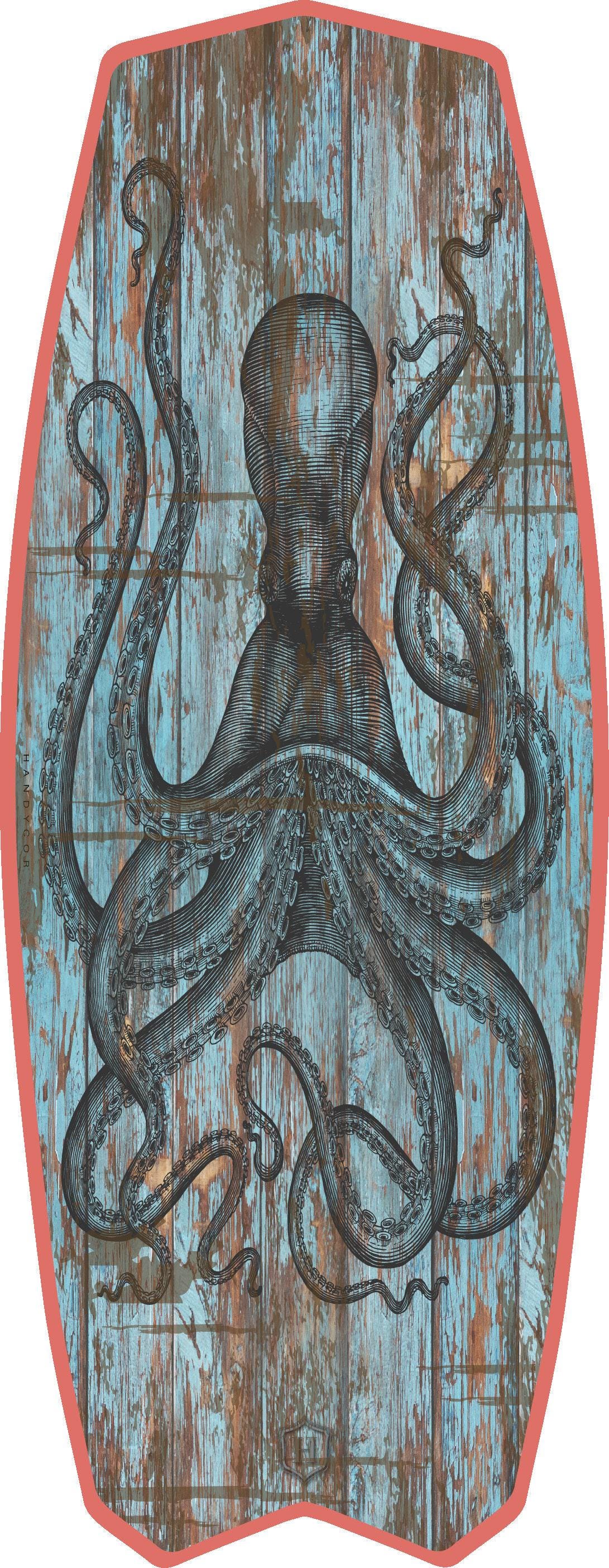 Surfboard coffee table with black octopus print for nautical decor