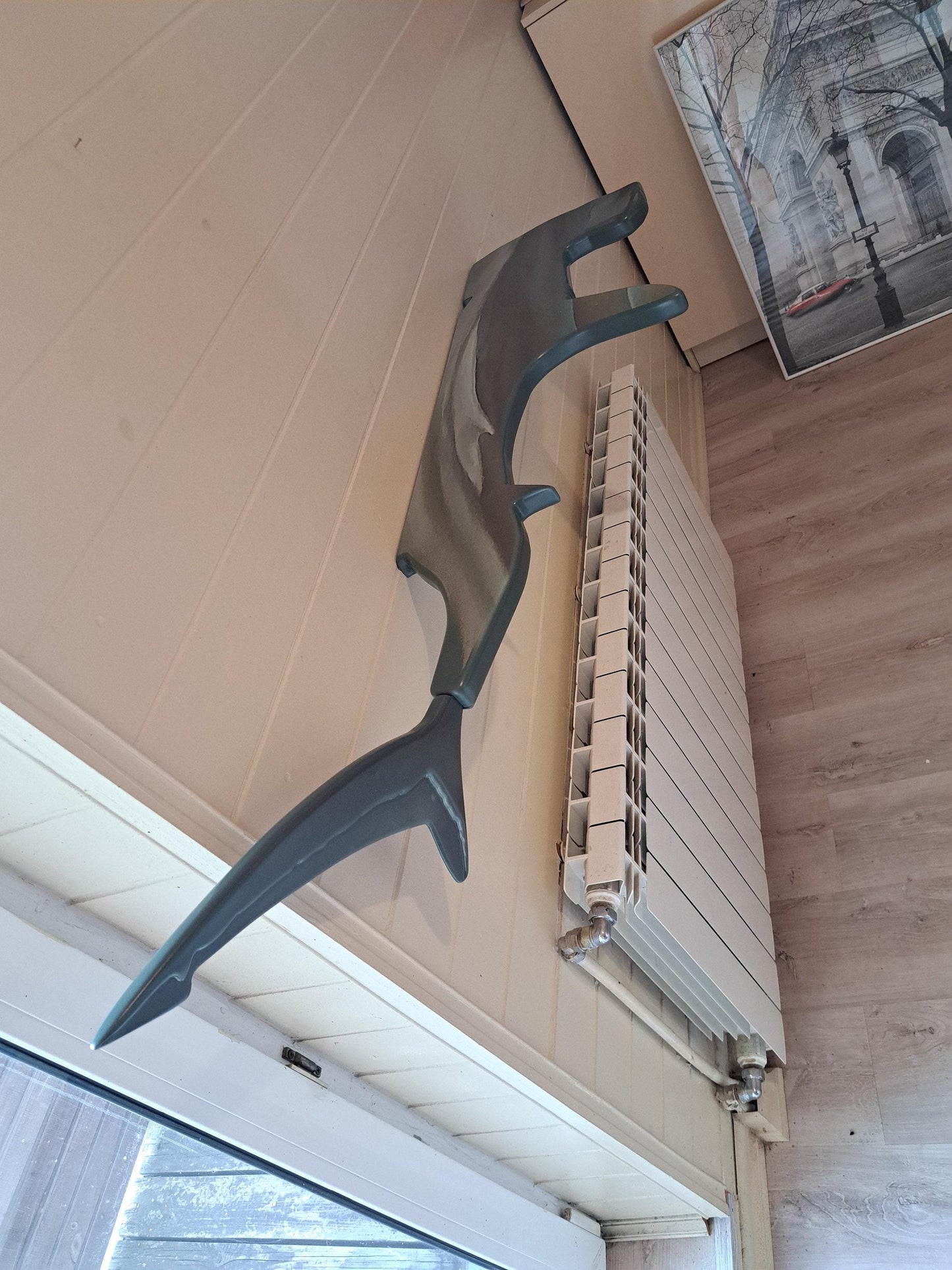 Shelf in the shape of a hammerhead shark for wall decoration