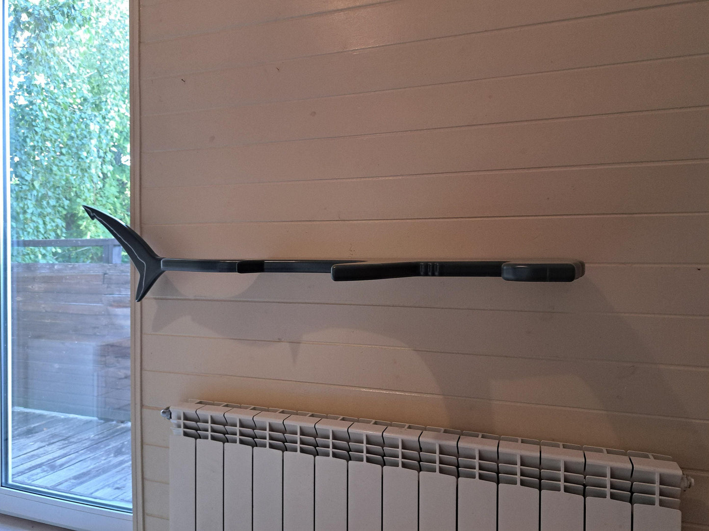 Shelf in the shape of a hammerhead shark for wall decoration