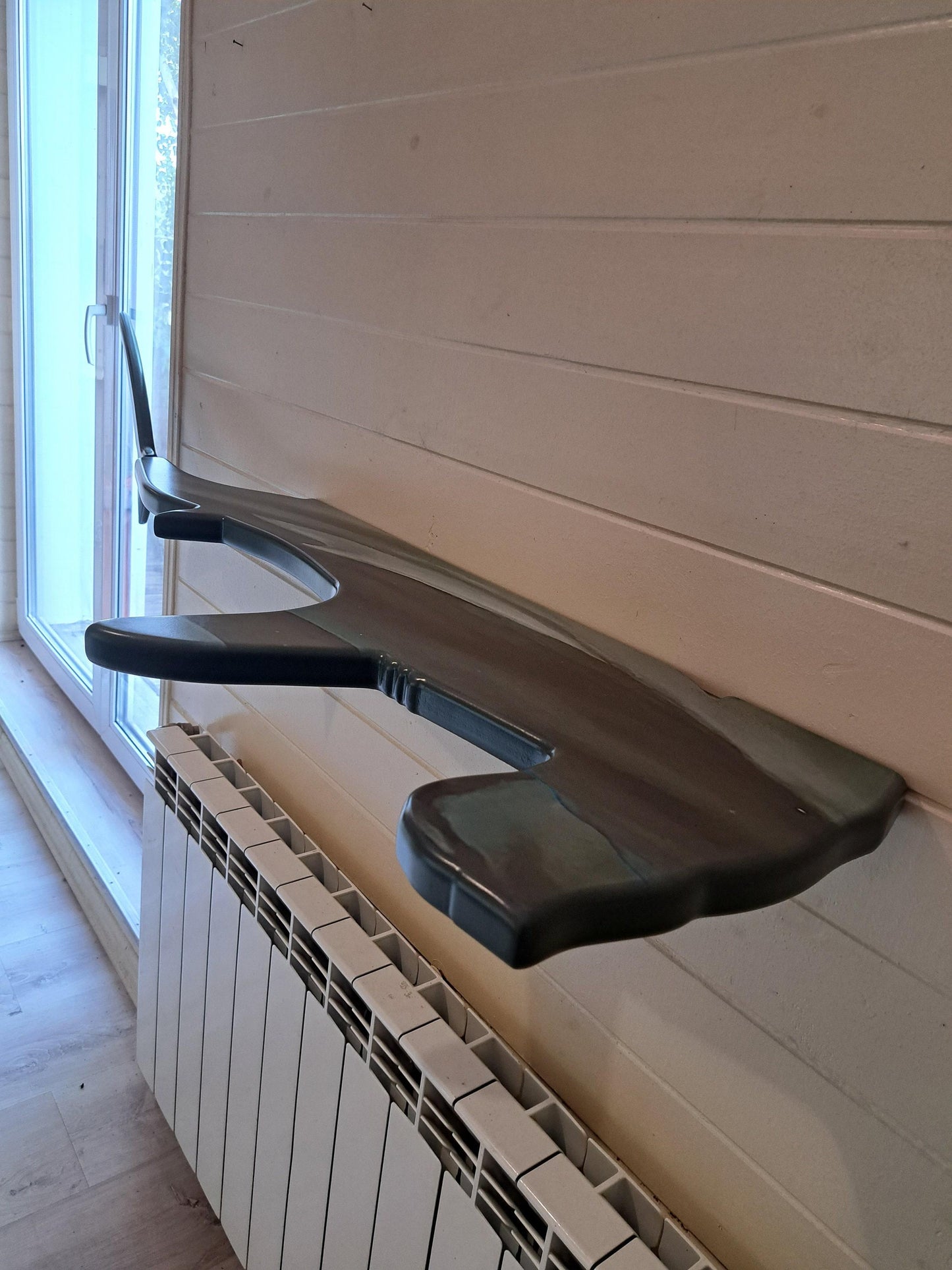 Shelf in the shape of a hammerhead shark for wall decoration