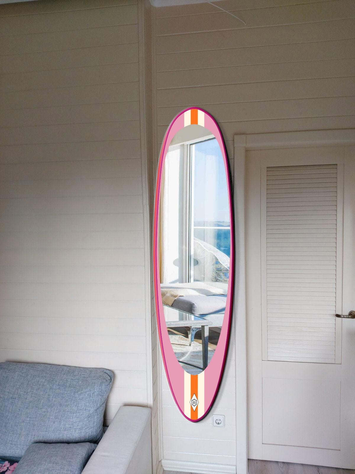 Wall mirror in surfboard shaped frame