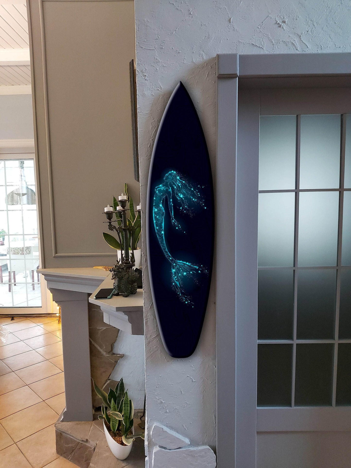 Surfboard wall art with mermaid