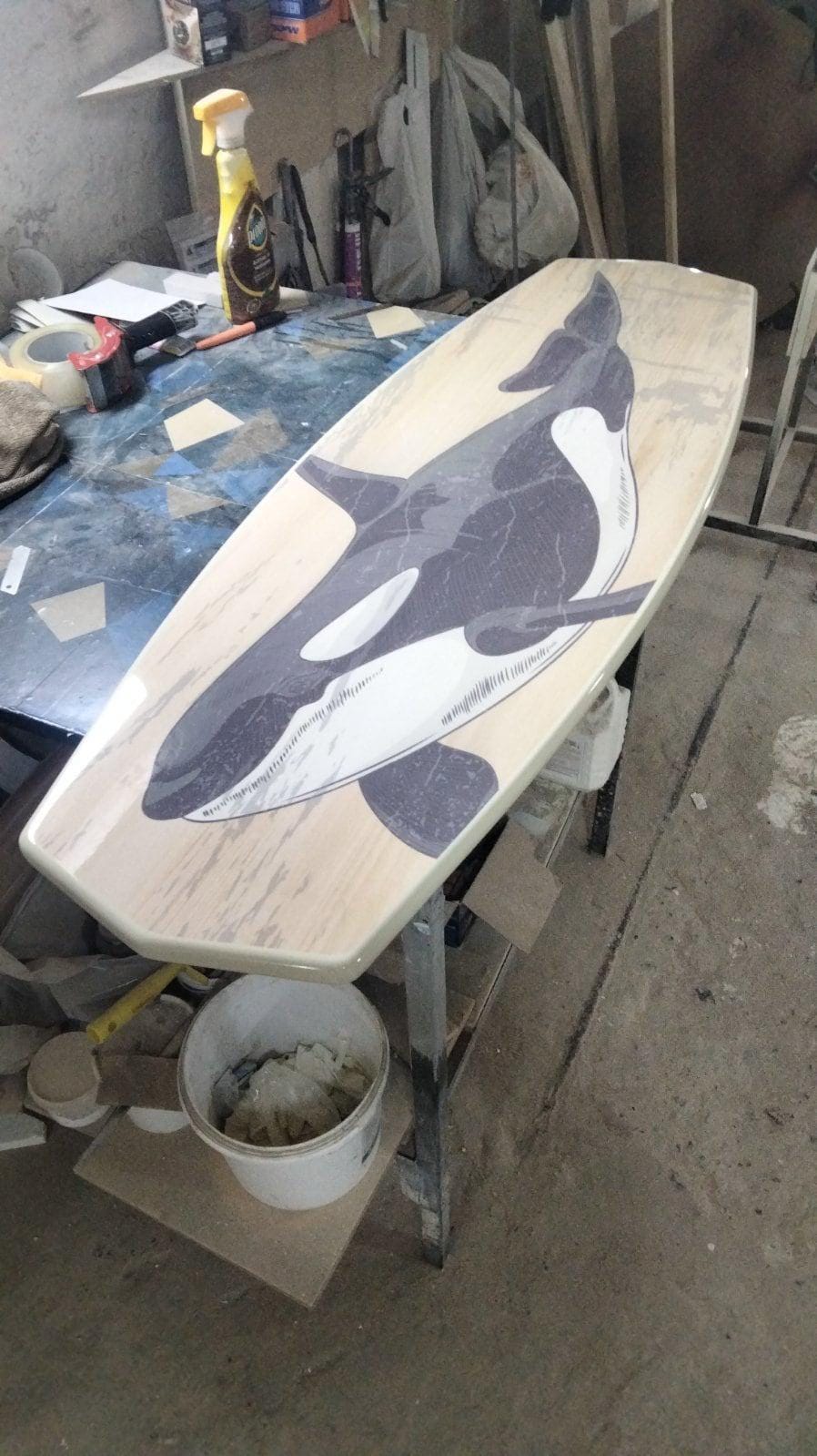 Surfboard coffee table with orca , killer whale