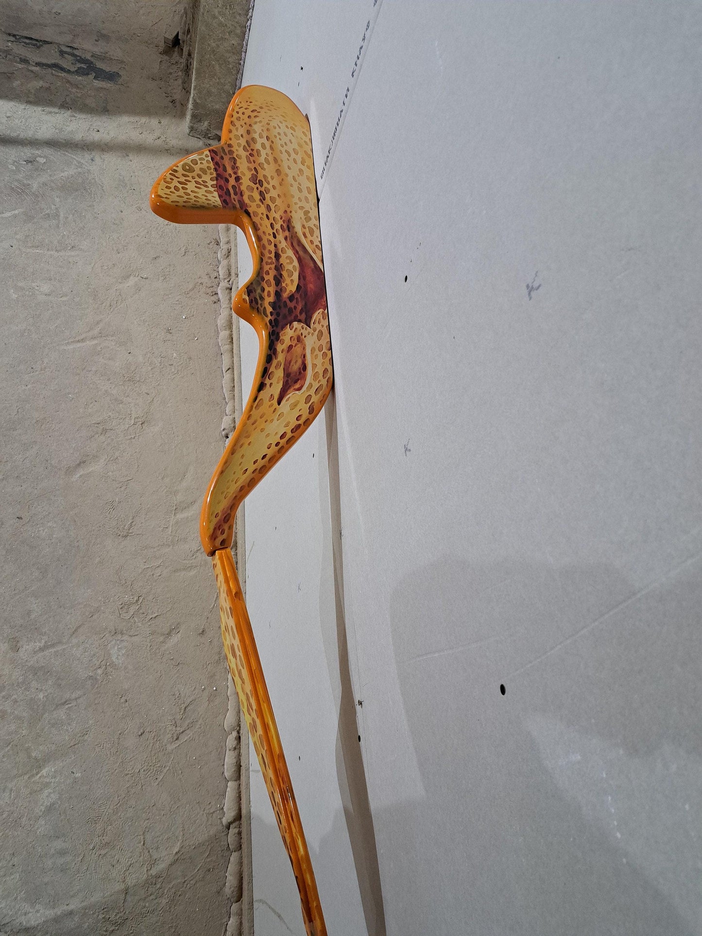 Shelf in the shape of a leopard shark for wall decoration