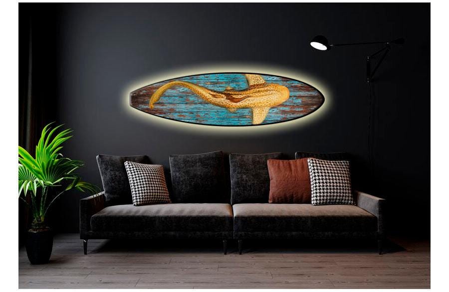 Surfboard-shaped LED wall light with a realistic leopard shark print.
