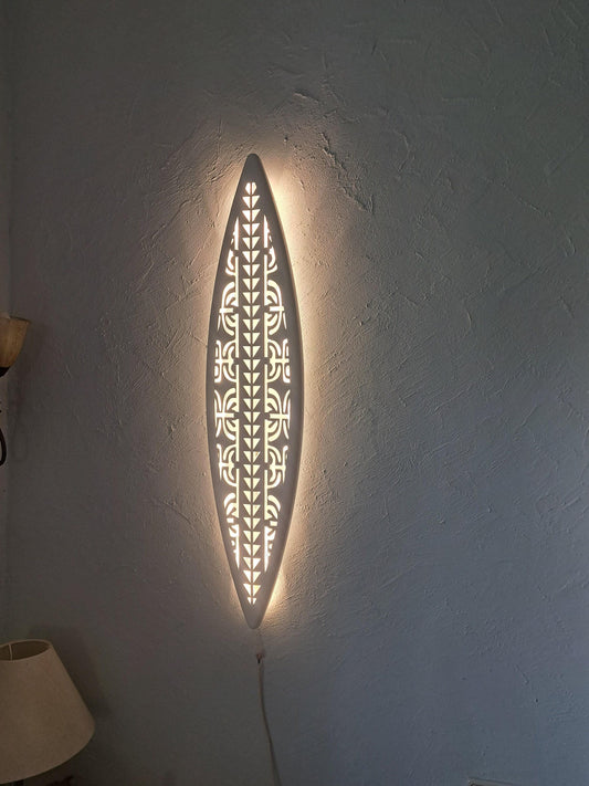 Surfboard inspired wall led light with maori pattern