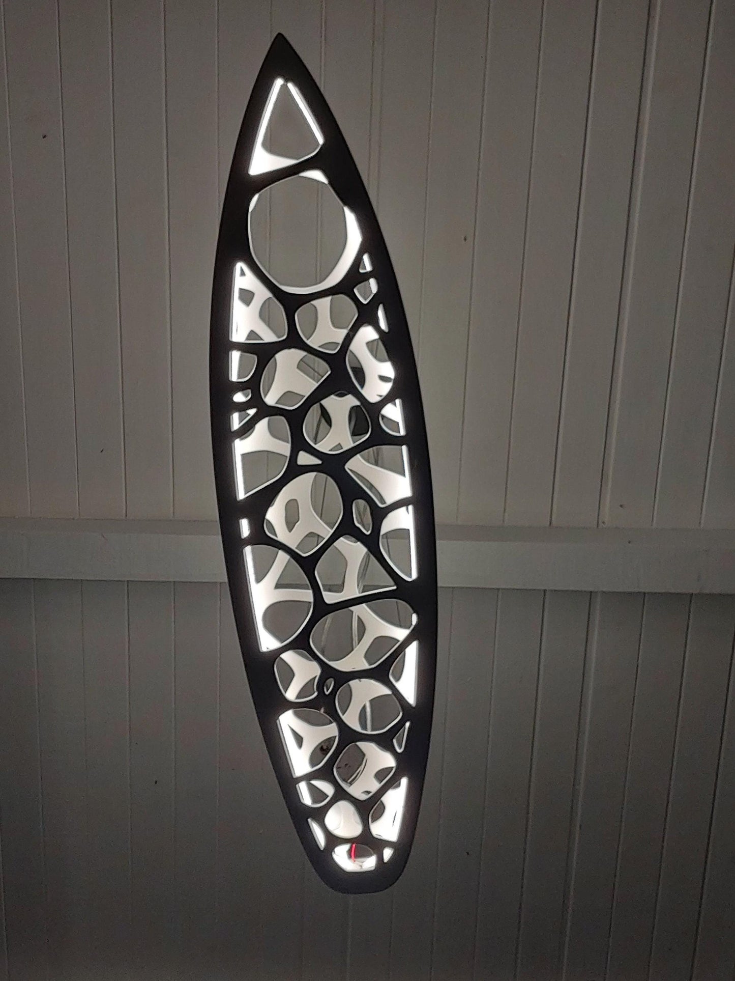 Surfboard shaped wooden decorative chandelier with carved sea ripple effect