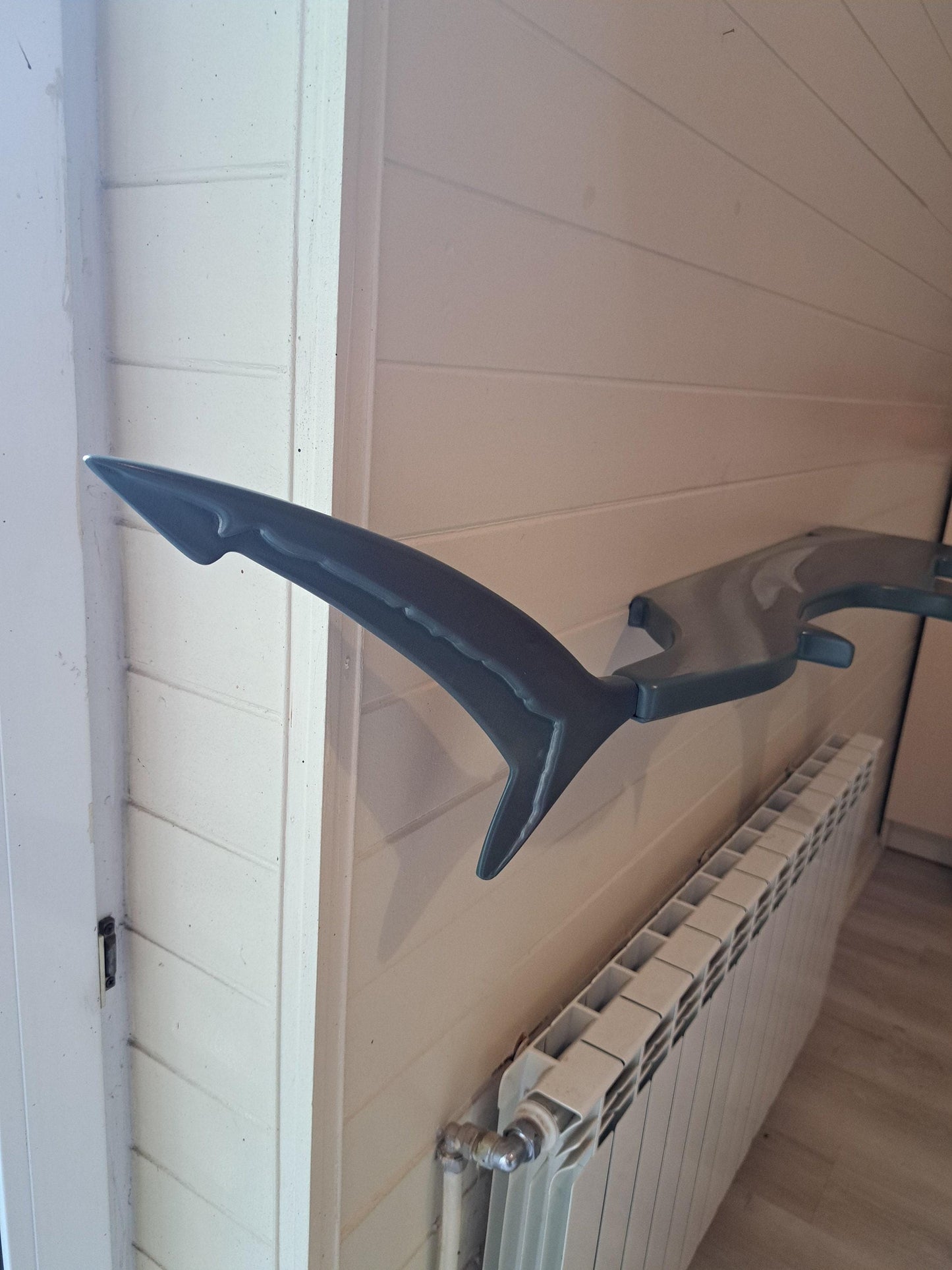 Shelf in the shape of a hammerhead shark for wall decoration
