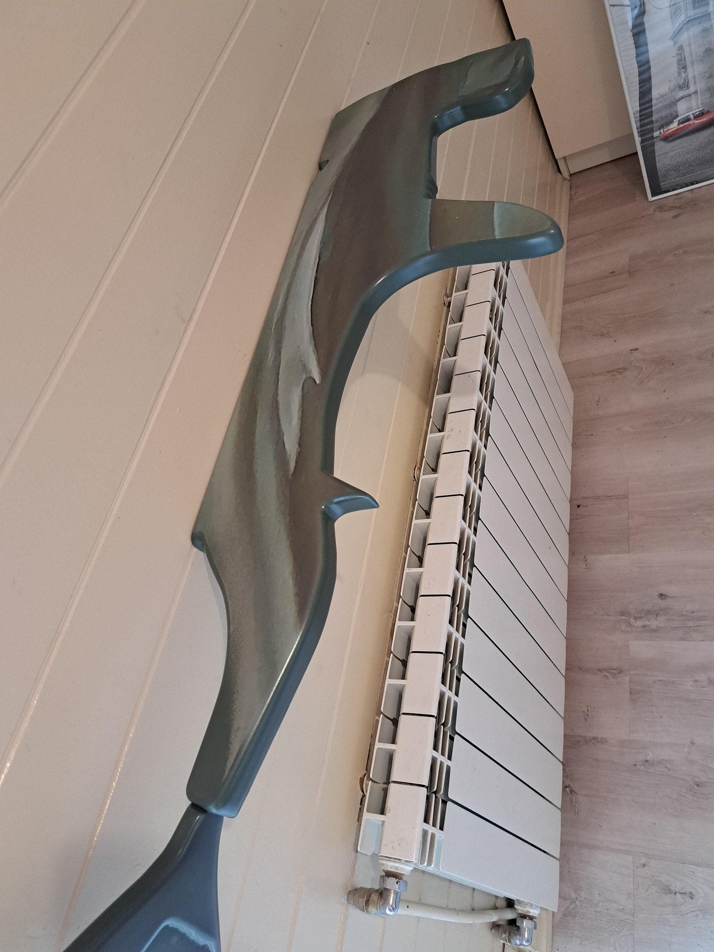 Shelf in the shape of a hammerhead shark for wall decoration