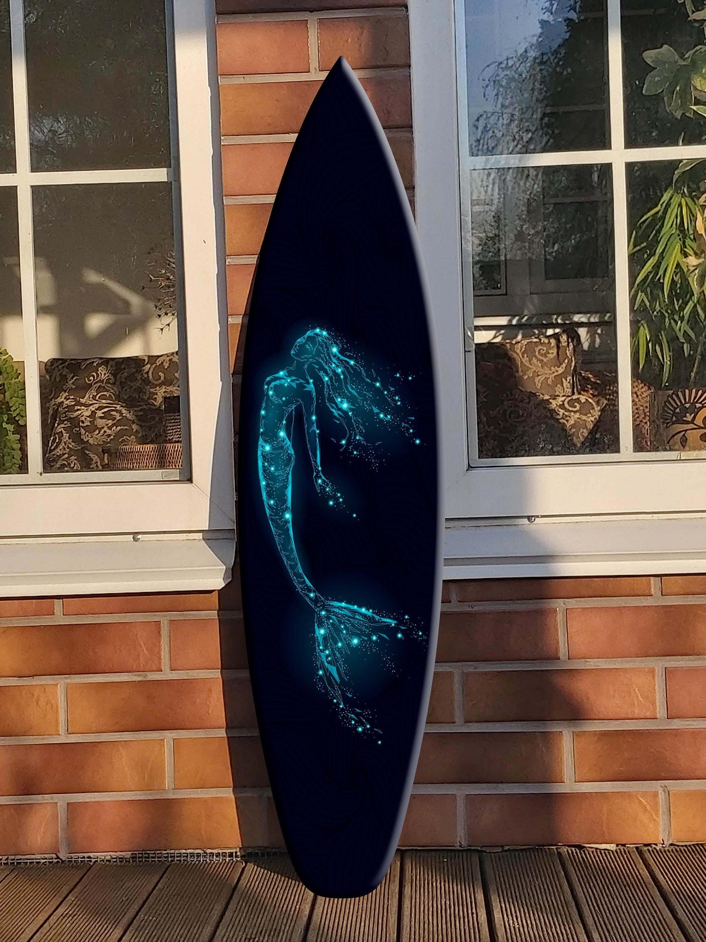 Surfboard wall art with mermaid