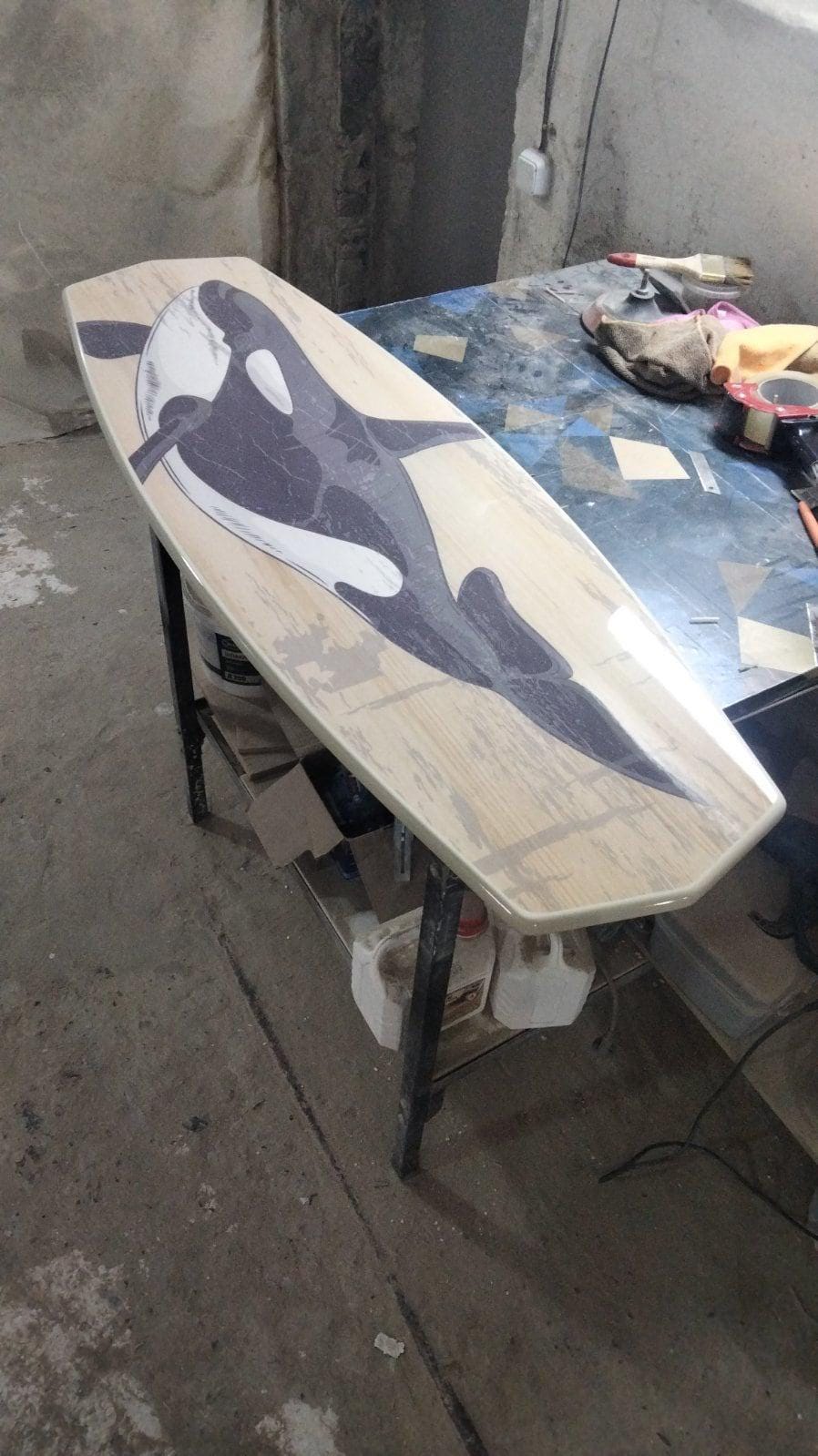 Surfboard coffee table with orca , killer whale