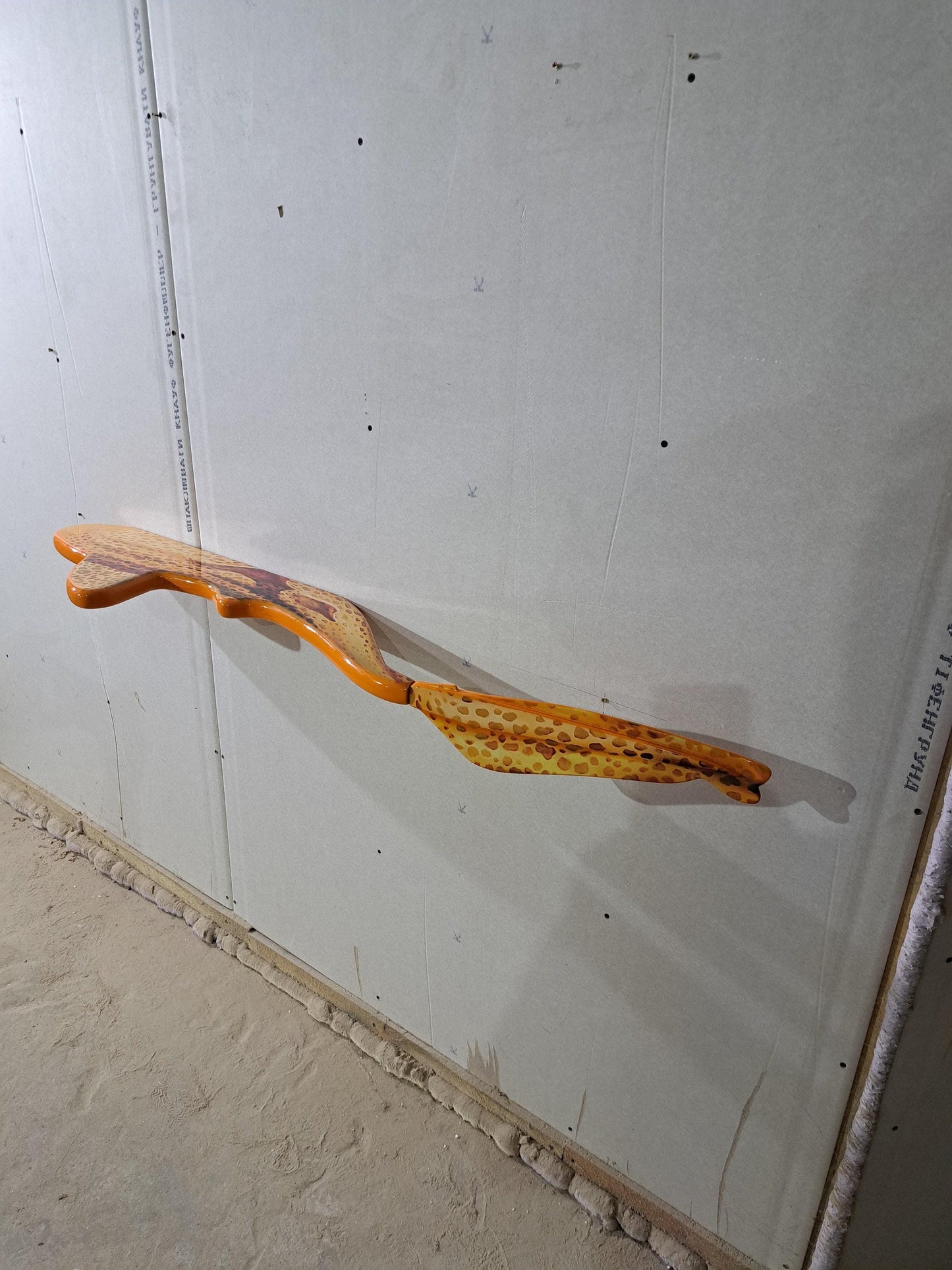 Shelf in the shape of a leopard shark for wall decoration