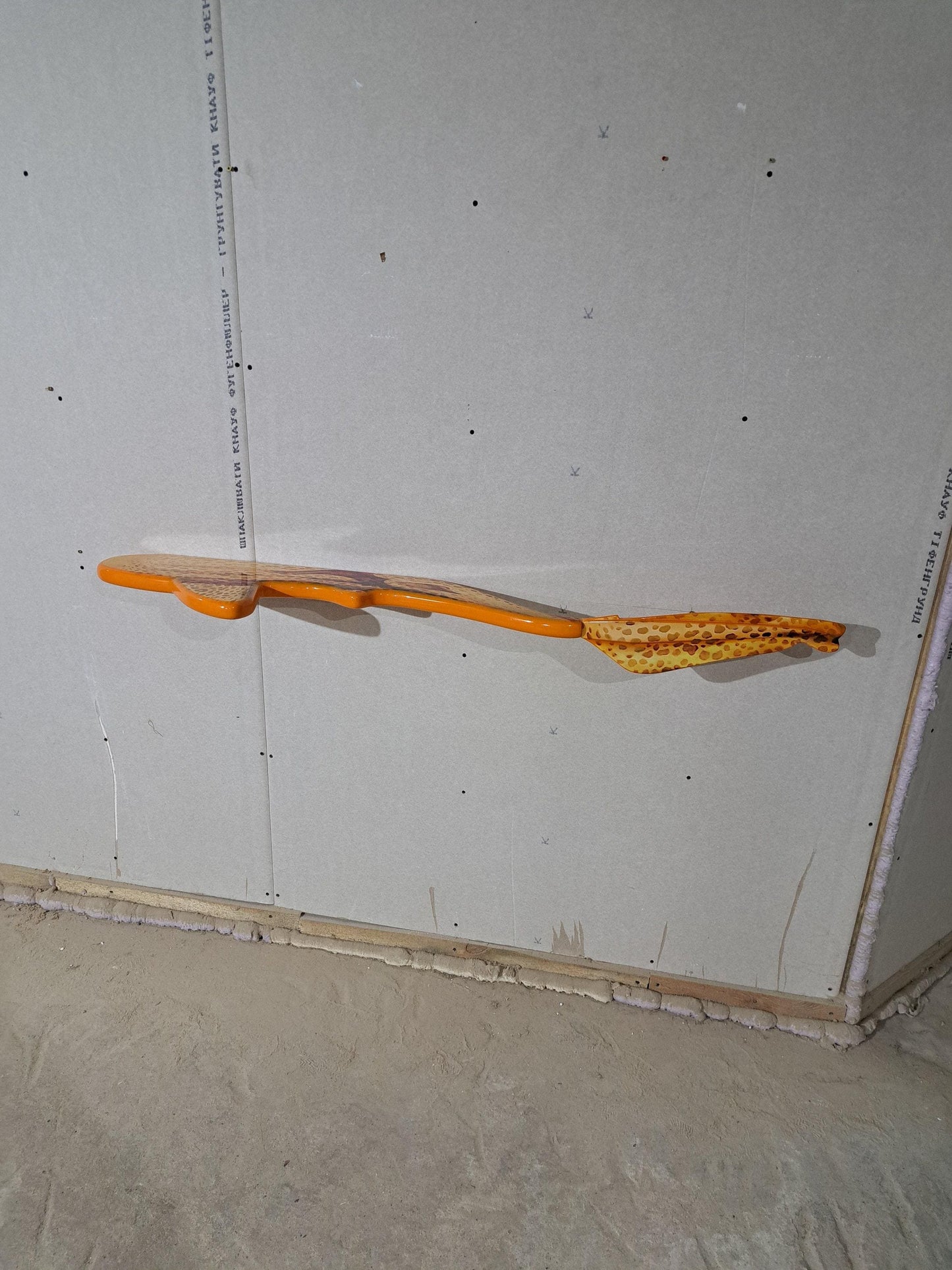 Shelf in the shape of a leopard shark for wall decoration