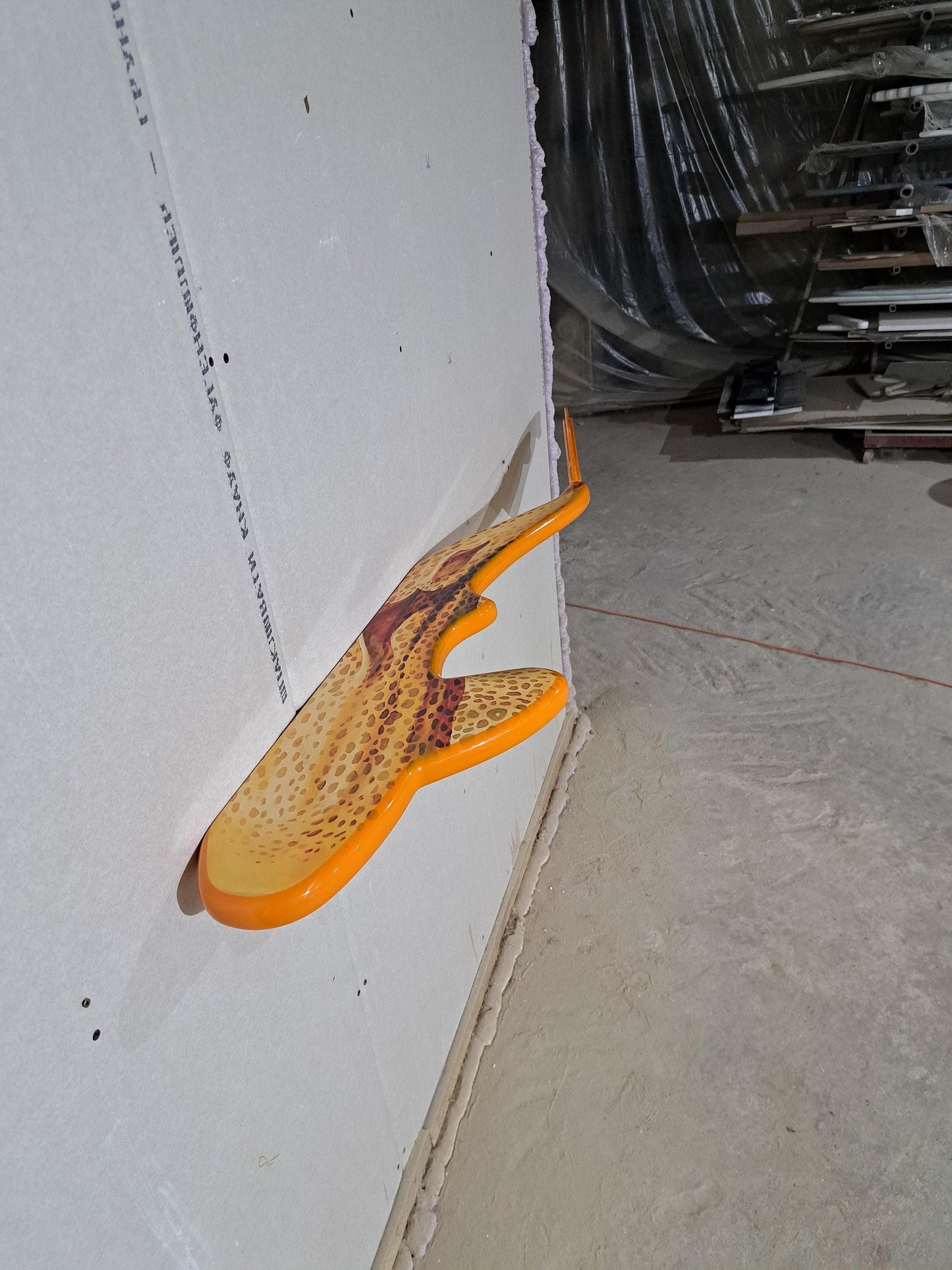 Shelf in the shape of a leopard shark for wall decoration