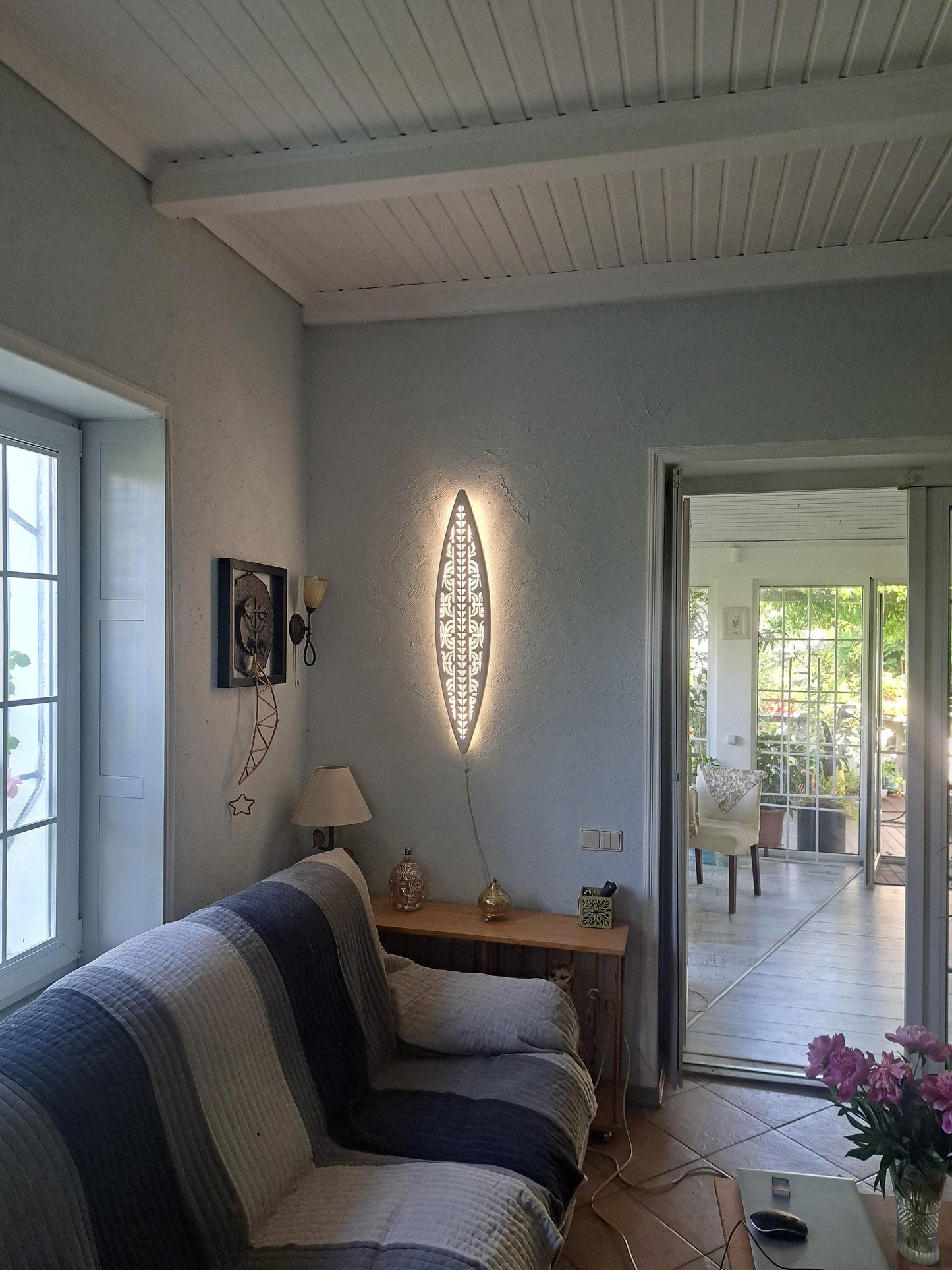 Surfboard inspired wall led light with maori pattern