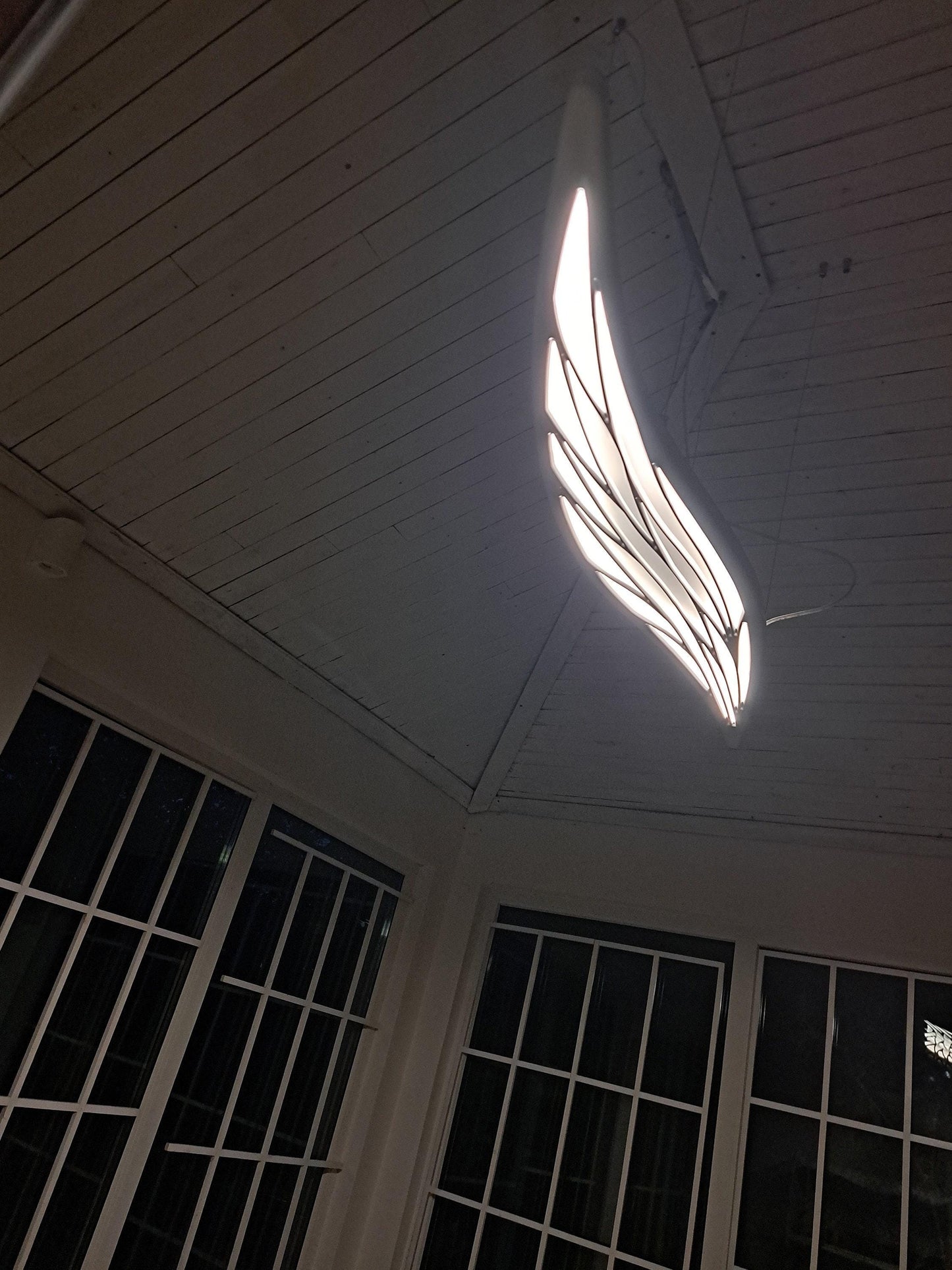 Surfboard inspired wall led light with maori pattern