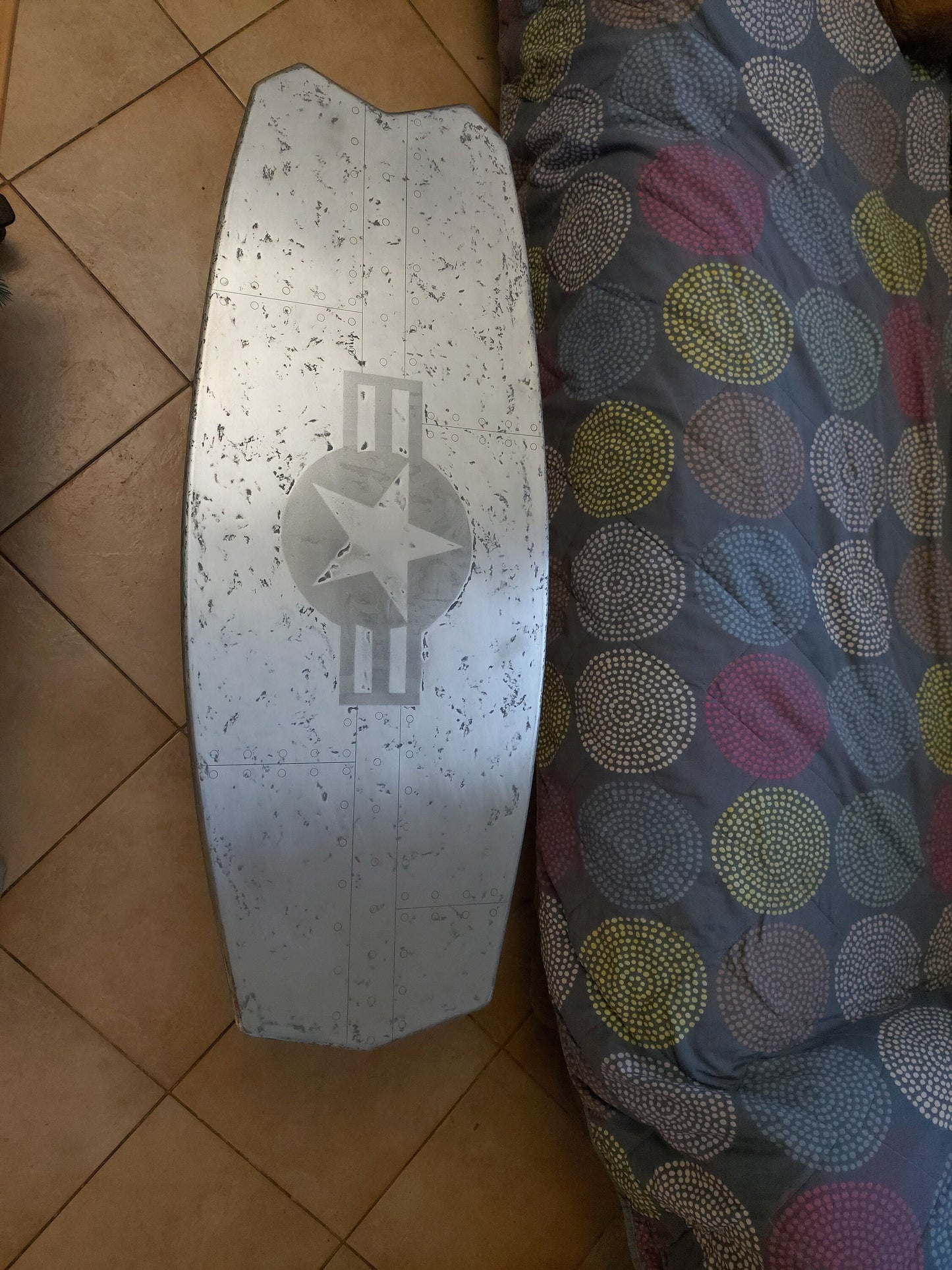 Steampunk-Inspired Kiteboard Table with Star and Rivets Pattern